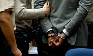 07nov011_murray_handcuffed_02.jpg